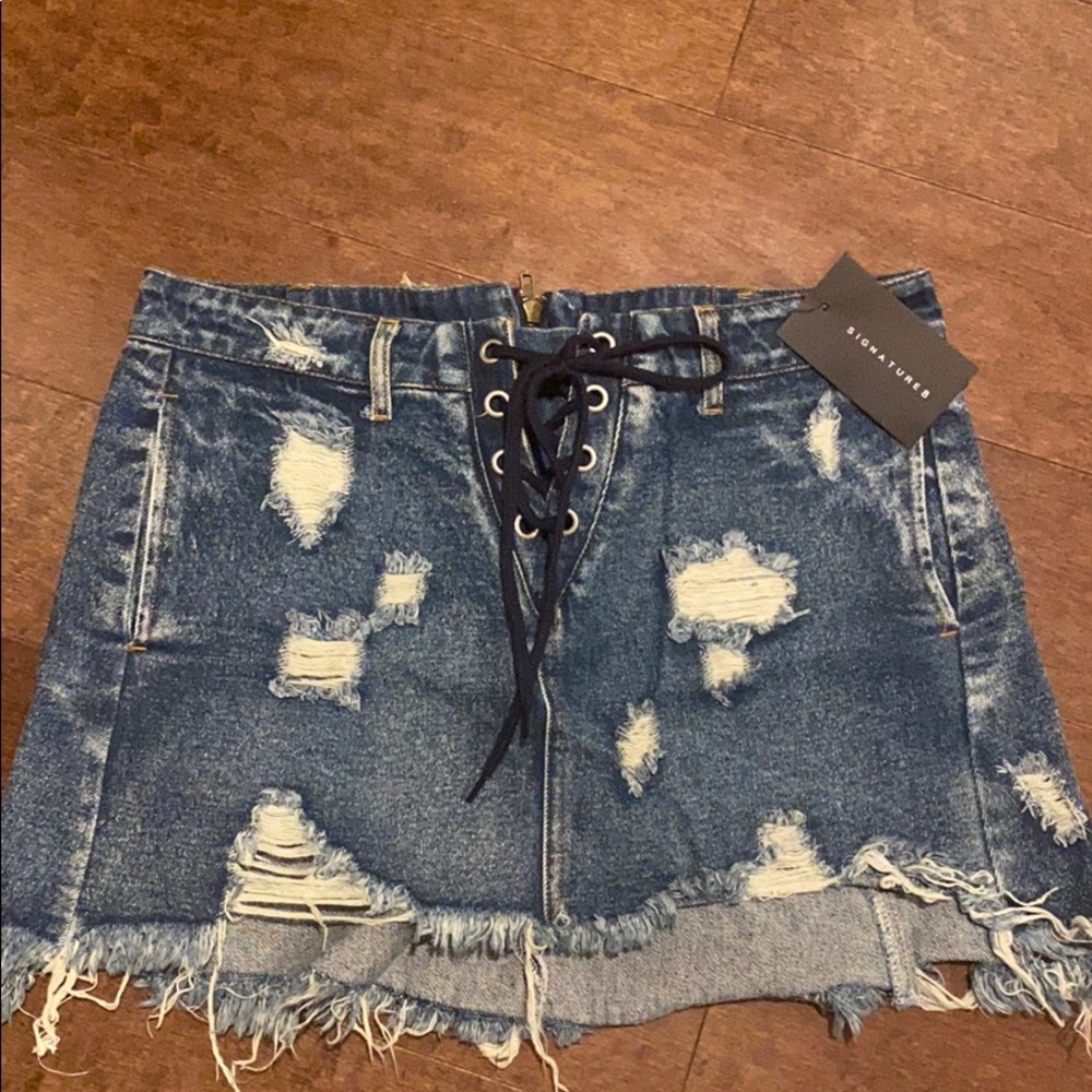 Distressed denim skirt